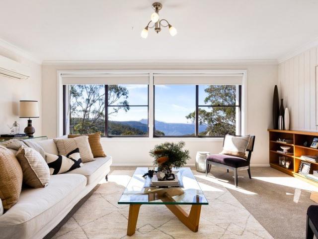 EMBRACE THIS RARE OPPORTUNITY WITH COMMANDING GROSE VALLEY VISTAS