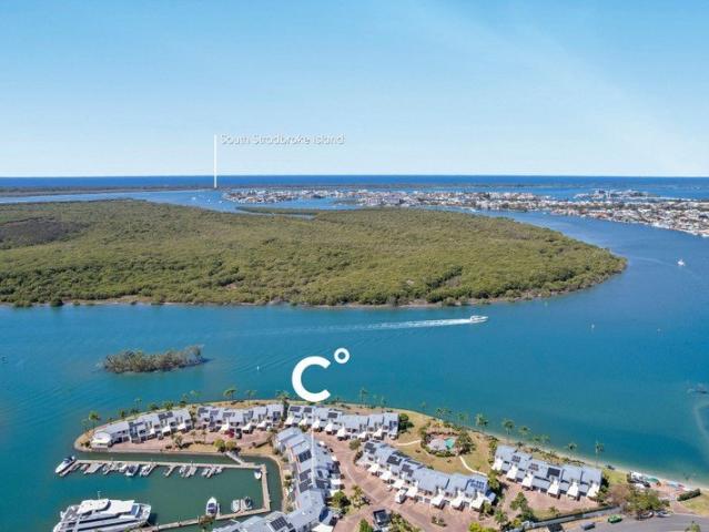 Embrace tranquil waterfront living in this beautiful north facing home
