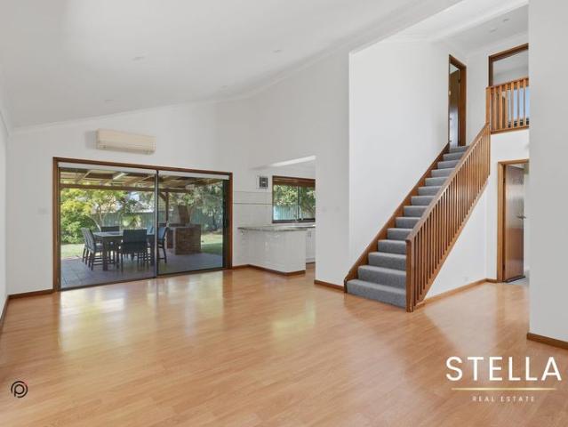 Embracing relaxed family living with leafy vistas