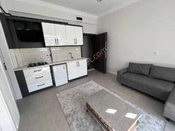 Emin Emlak Kiralıyor. Osmangazi Mahallesi Eşyalı Asansörlü Kiralık1+1 Apart