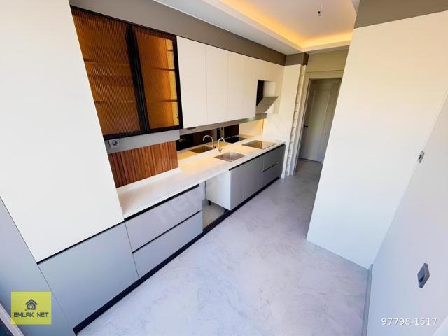 EMLAK NET GÜVENCESİNDE MERKEZİ KONUMDA SATILIK 2+1 DAİRE