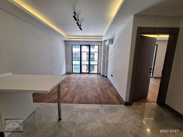 EMLAKLAR BÖLGESİN^DE EVA LOFT PROJESİNDE LÜKS 1+1