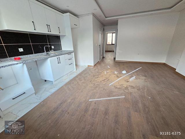 EN UYGUN EMLAK'TAN EMAAR AVM 13 DK SIFIR 1+1 BAHÇE KATI DAİRE