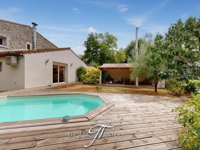 EN EXCLUSIVITE MAISON EN PIERRE JARDIN PISCINE GARAGE CLIMATISATION FAIBLE TAXE FONCIÈRE
