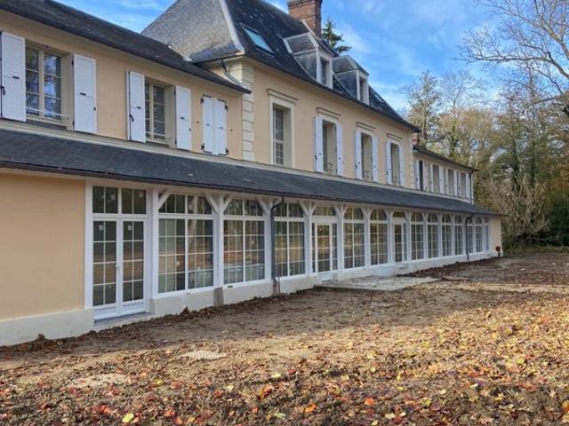 En RDJ: 3 pièces avec véranda, jardin privatif et 2 places de stationnement !