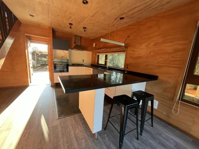 Encantadora casa con estero y maravillosa vegetación, mirando al volcán! 3 dormitorios por 230000. 00 en Pucón