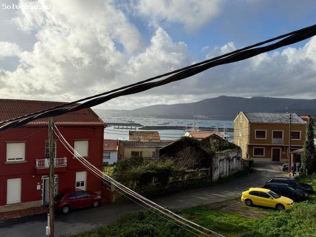 Encantadora Casa de Dos Plantas con Espectaculares Vistas al Mar