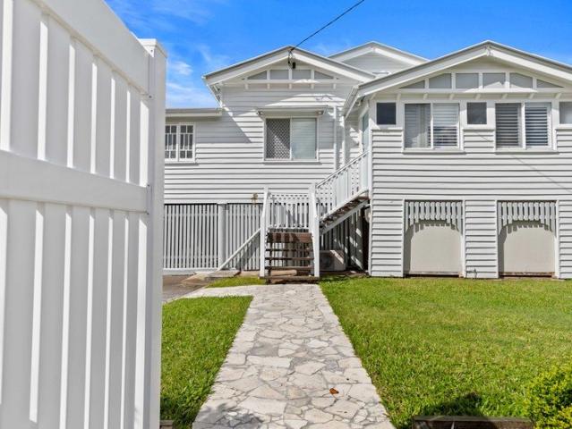 Enchanting 1940s Queenslander: Modern Luxury Meets Timeless Charm
