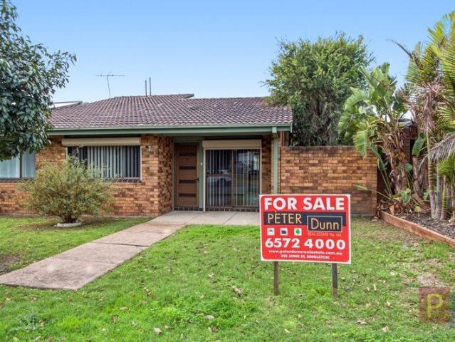 END UNIT WITH LOCK UP CARPORT & YARD