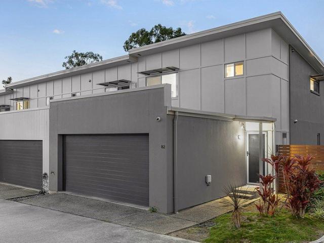 End Unit with Side By Side Double Garage & Close proximity to Shops