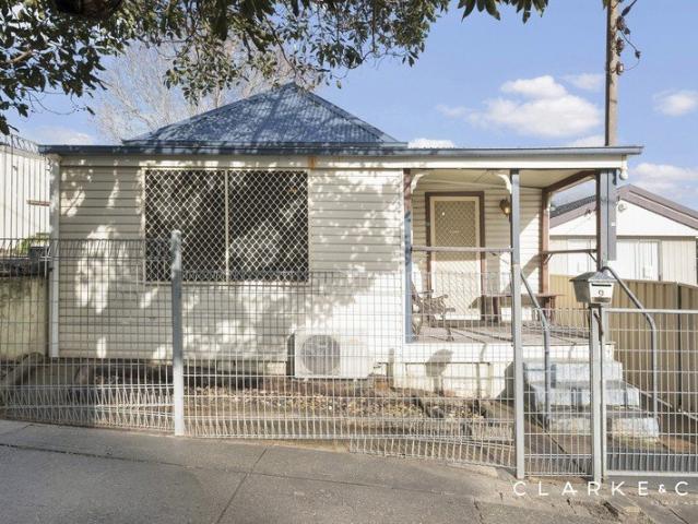 ENDLESS POTENTIAL WITH A STANDOUT SHED AND PRIME LOCATION!