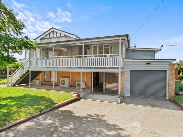 LARGE HIGHSET HOME WITH DEVELOPMENT POTENTIAL