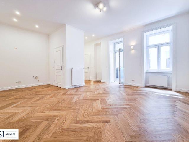 Energetisch revitalisierter Altbau: Hochwertige 4 Zimmer Wohnung mit Balkon in zentraler Lage