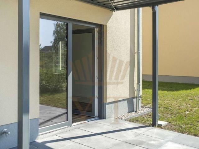 Energieeffiziente 2 Zimmer Wohnung | mit West Terrasse & Gartenanteil | in Ahrensfelde