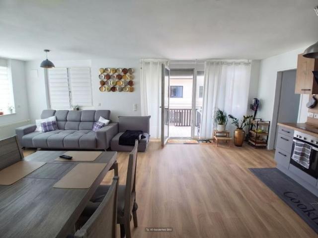 Energieeffiziente Wohnung mit Westbalkon + Tiefgarage in zentraler Lage