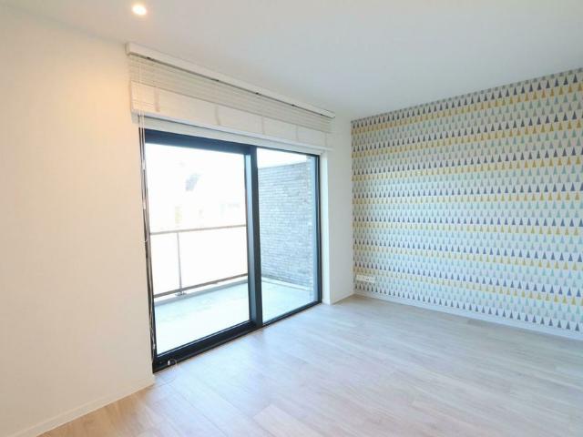 Energiezuinig appartement met 2 terrassen op het kerkplein van Melsele!
