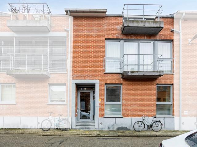 Energiezuinig gelijkvloers appartement met 2 slpks en stadstuin