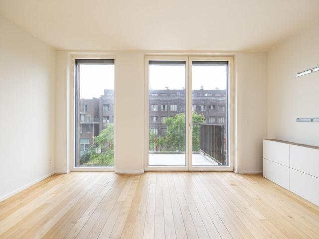 Energiezuinig 1 slaapkamerappartement met terras en parkeerplaats op het Eilandje