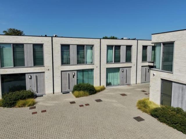 Energiezuinige woning met tijdloze architectuur in het ch.