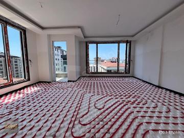 ŞENESENEVLER'DE 2026 HAZİRAN TESLİM 130m2 3+1 E.BANYOLU, BALKONLU KISMİ DENİZ MANZ. DAİRE