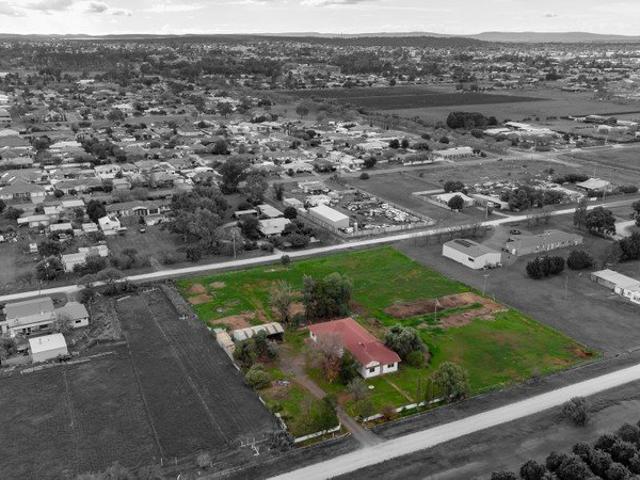Enjoy the Space of Rural Living Without Leaving Town Behind