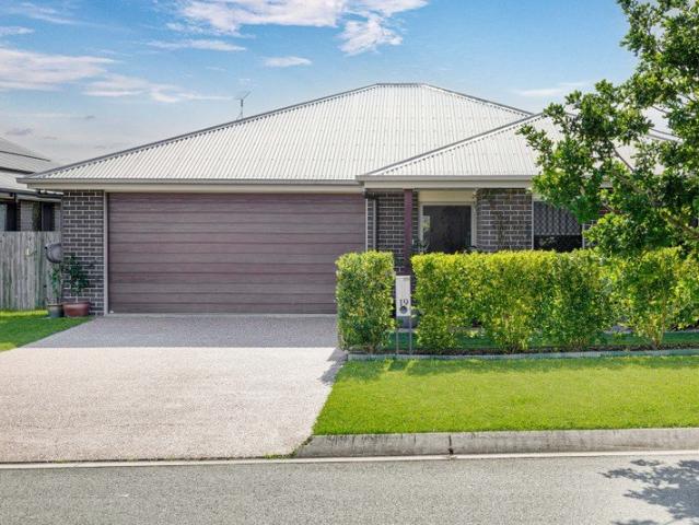 Enjoy uninterrupted green views and a resort style lifestyle in this beautifully maintained Rivers Edge home