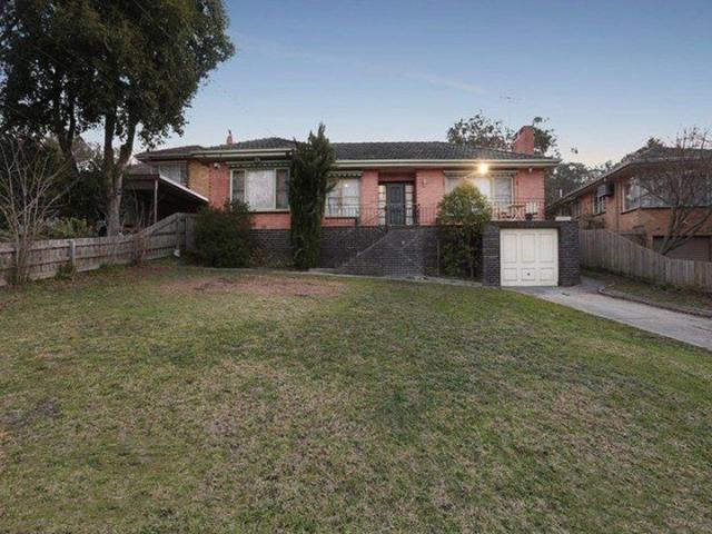 ENJOY A LARGE BACKYARD AND CONVENIENT LOCATION