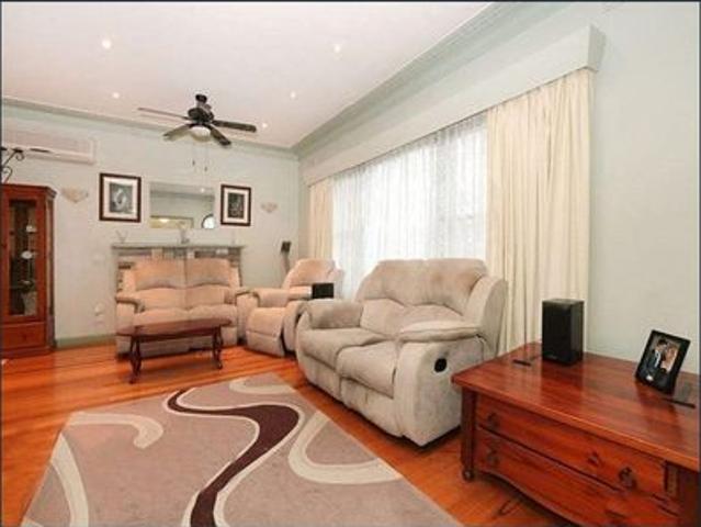 ENJOY A LARGE BACKYARD AND CONVENIENT LOCATION
