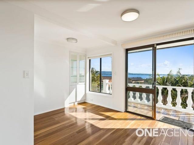 ENJOY ELEVATED FAMILY LIVING WITH STUNNING LAKE AND OCEAN VIEWS