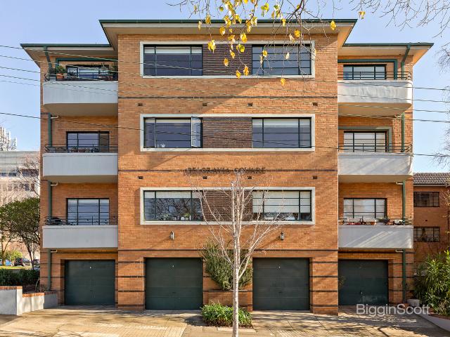 ENJOY PARKSIDE LIVING IN THIS FRESHLY PAINTED, NEWLY CARPETED 2 BEDROOM ART DECO APARTMENT WITH LOCK UP GARAGE/STORAGE & BALCONY