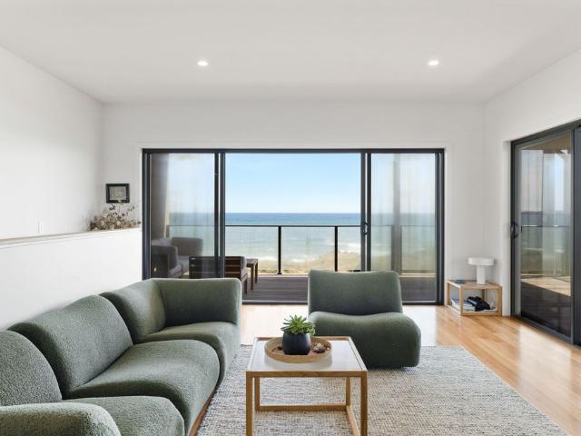 Enjoy relaxed coastal living in this modern, absolute beachfront home located on beautiful Phillip Island