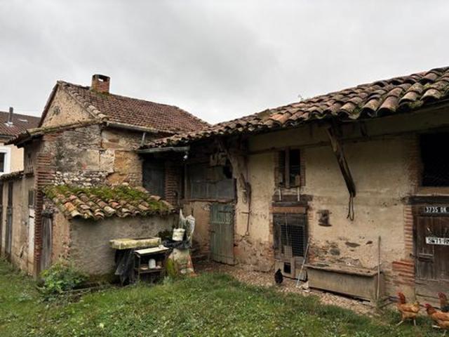 Ensemble corps de ferme + terrain constructible