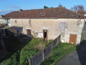 Ensemble de 2 Maisons avec Terrain et Dépendances Proche de Lizant
