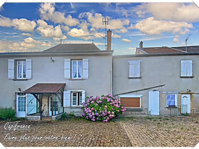 ENSEMBLE IMMOBILIER COMPRENANT 2 MAISONS DE VILLAGE SUR TERRAIN DE 2285 m²