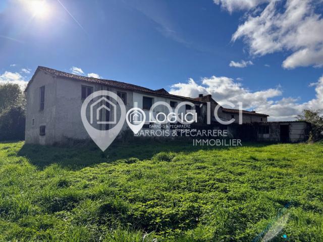Ensemble immobilier et terrain avec fort potentiel