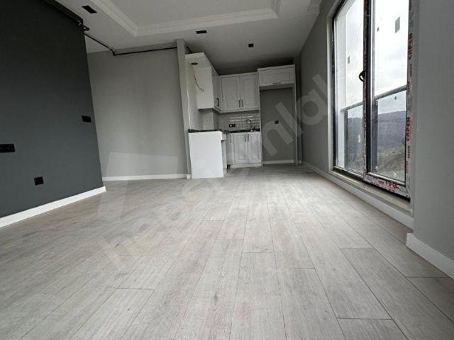 Şentürk gayrimenkulden pamuklu bulvarında kiralık boş 1+1 daire