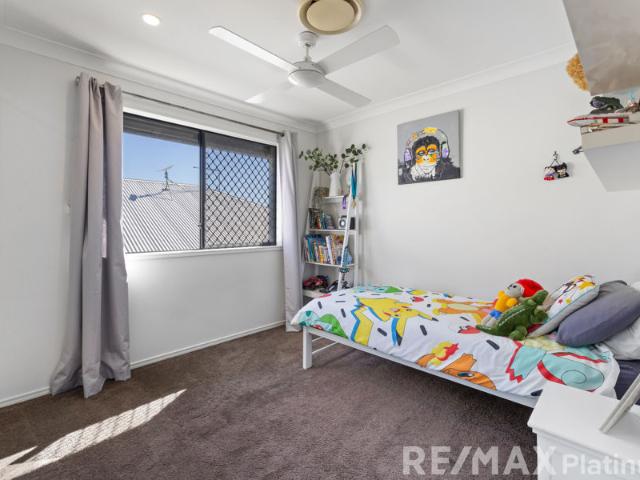 Side Access, Modern Home & Priced to Sell!