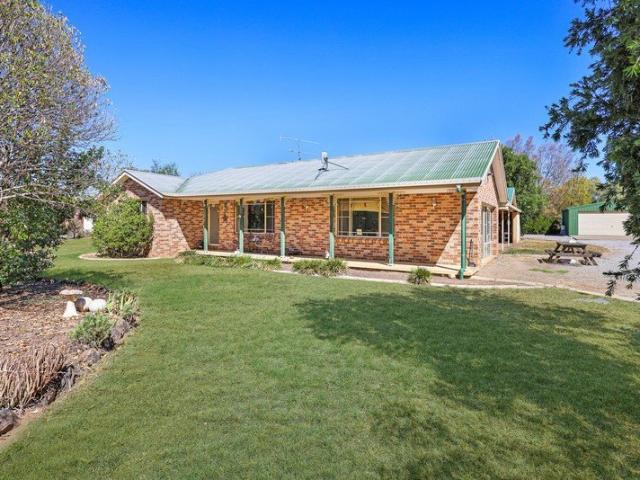 Peaceful, Acreage Living with Space for the Whole Family