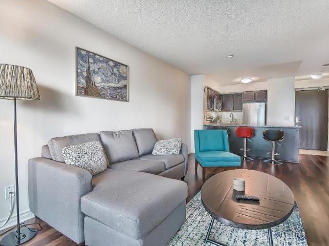 Entertainment District Toronto Furnished Condo Rental at Infinity Modern 1 Bedroom with 1 Bathroom plus Balcony and Superb Views