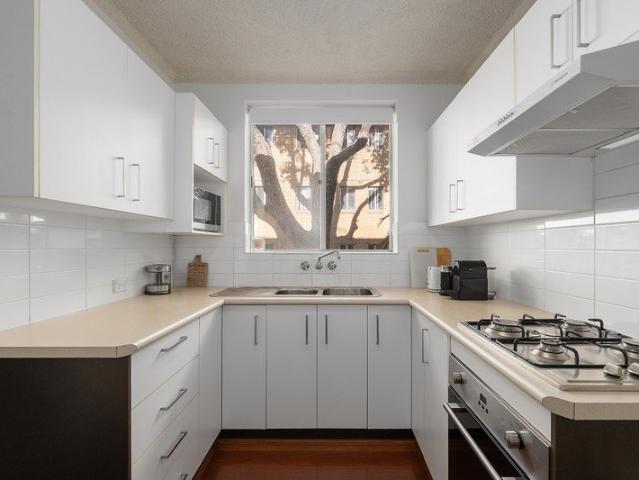 Renovated Full Brick Apartment Offers a Convenient Home or Solid Investment