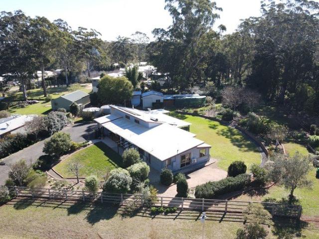 Environmentally built sustainable home, sheds, solar, and a bore on a 3,440m2 block