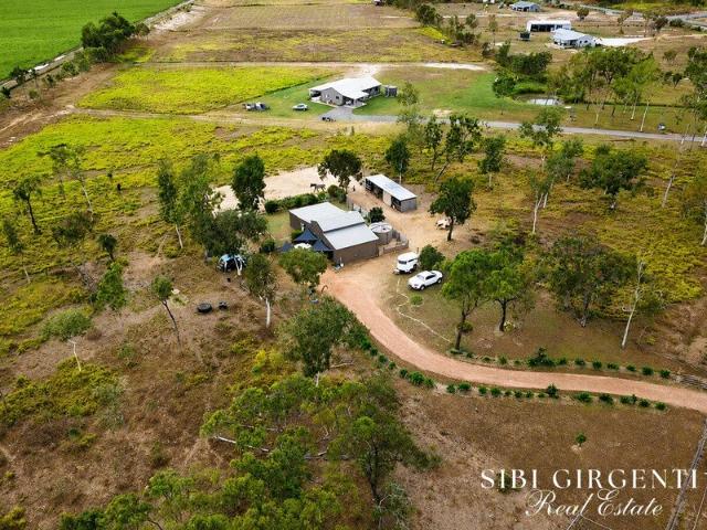 Escape to peaceful acreage living in Arriga