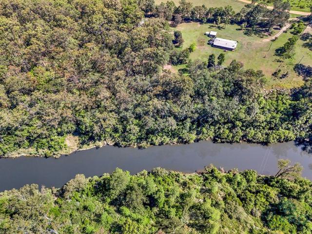 Escape to Your Own Slice of Paradise: A Rural Haven with Riverfront Bliss