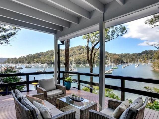Escape to your own private Fully Furnished Waterfront Acreage Boat Access Only