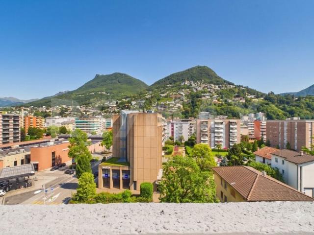 Esclusivo Attico con vista Lago e Monte Brè nel centro di Lugano
