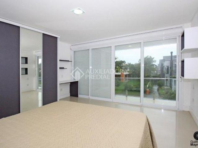 ESPETACULAR CASA COM 4 DORMITÓRIOS NO CONDADO DE CAPÃO!