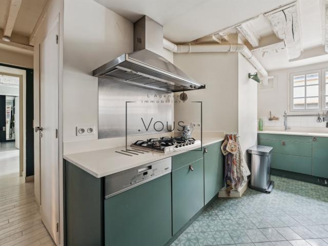 Esthétique quatre pièces dans le quartier des Enfants Rouges. 105m² Paris 3ème
