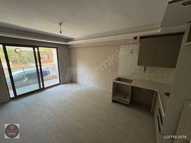ERDEK OCAKLAR'DA ÇARŞI İÇİ DENİZE 100 MT SATILIK 1+1 SIFIR DAİRE