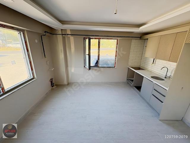 ERDEK OCAKLAR'DA MERKEZ'DE DENİZE 100 MT SATILIK 1+1 DAİRE
