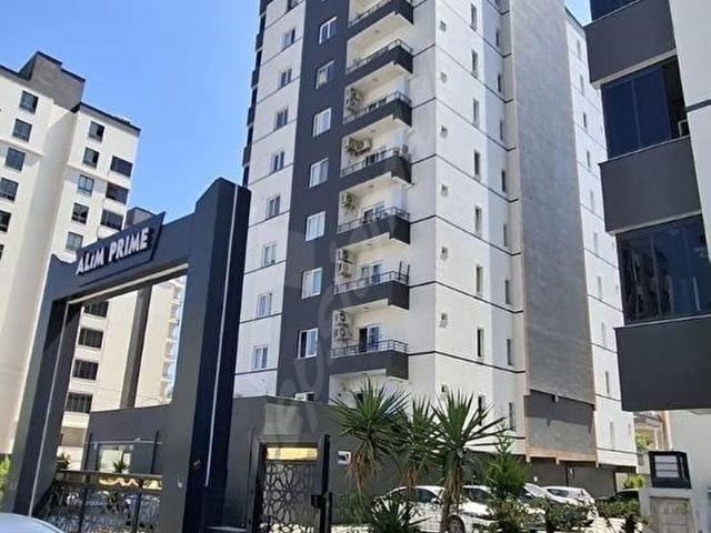 ERDEMLİ MERKEZ MAH.'DE HAVUZLU SOSYAL DONATILI 3+1 SATILIK DAİRE